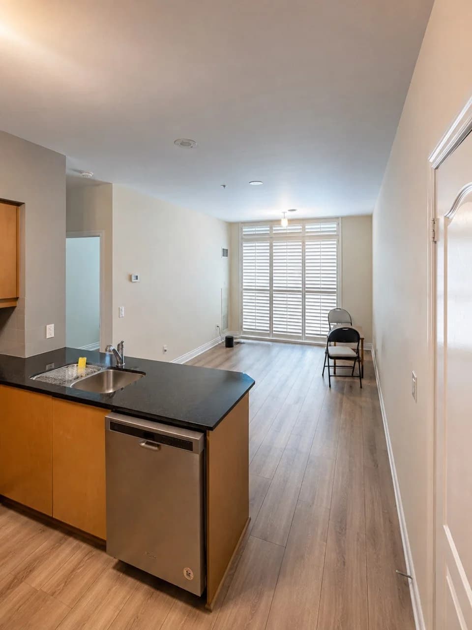 Open North York condo kitchen and living area after interior painting and ceiling work